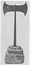 Fig. 9. Double Axe and Stepped Steatite Socket from Dictaean Cave. (Psychro)<br> (From <i>Arch&aelig;olagia</i>, by kind permission of the Society of Antiquaries, and Sir Arthur Evans)